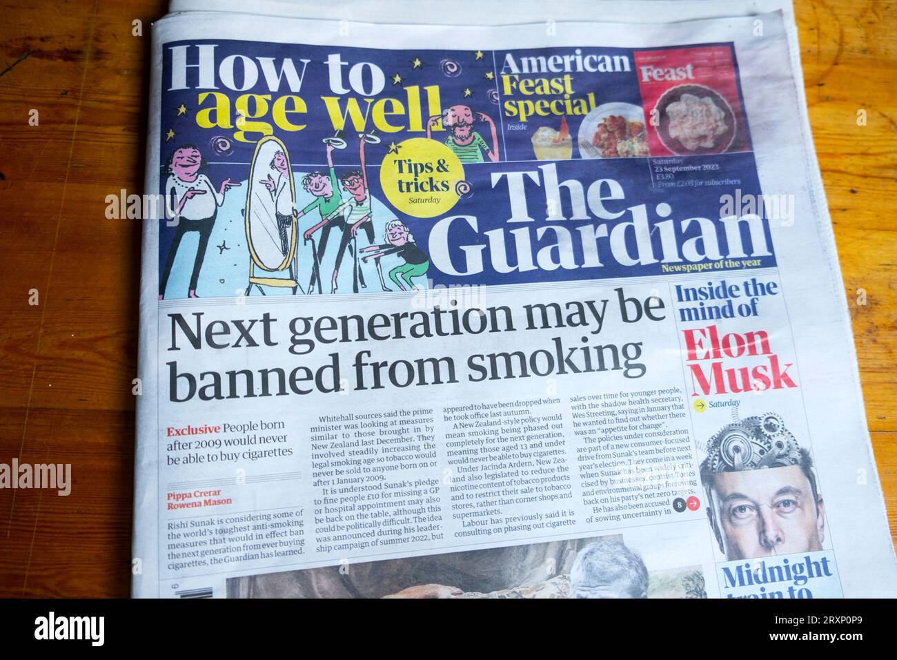 'Next generation may be banned from smoking' front page Guardian newspaper headline cigarettes health article and Elon Musk mind 23 September 2023 UK Stock Photo
