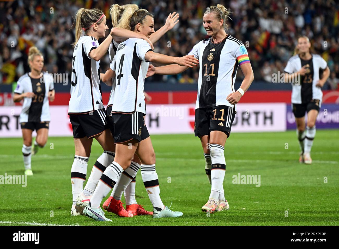 Bochum, Germany. 26th Sep, 2023. Soccer, Women: Nations League A women, Germany - Iceland, group stage, group 3, matchday 2. Germany's Kathrin Hendrich (l-r), Lea Schüller, Lena Lattwein and Alexandra Popp celebrate the goal for 3:0. Credit: Federico Gambarini/dpa/Alamy Live News Stock Photo
