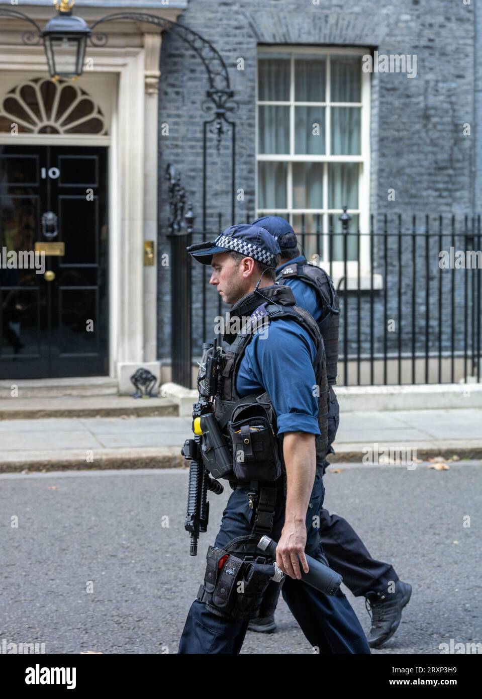 tree London, UK. 26th Sep, 2023. Despite reports that many 'Authorised firearms officers' (AFO's) have handed in their firearms certificates due to the charging by the CPS of on of their colleagues; Downing Street remains patrolled and protected by armed metropolitan police officers, Credit: Ian Davidson/Alamy Live News Stock Photo