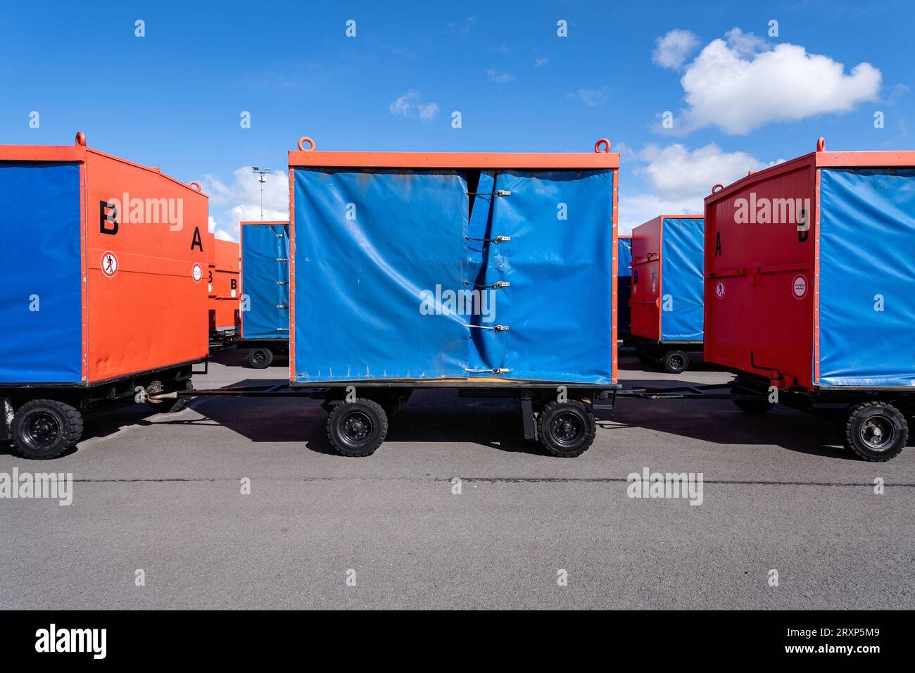 baggage carts for island traffic at sea terminal Stock Photo