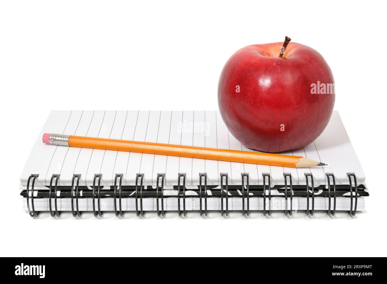 Notebook and apple isolated on white Stock Photo