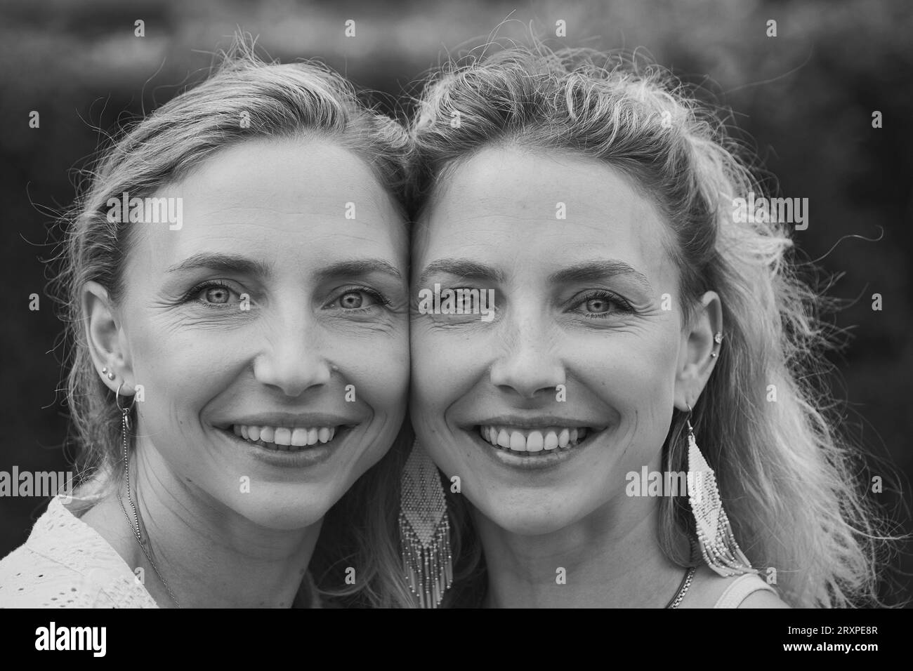 Ulfborg, Denmark, June 24, 2023:The two twins are smiling Stock Photo