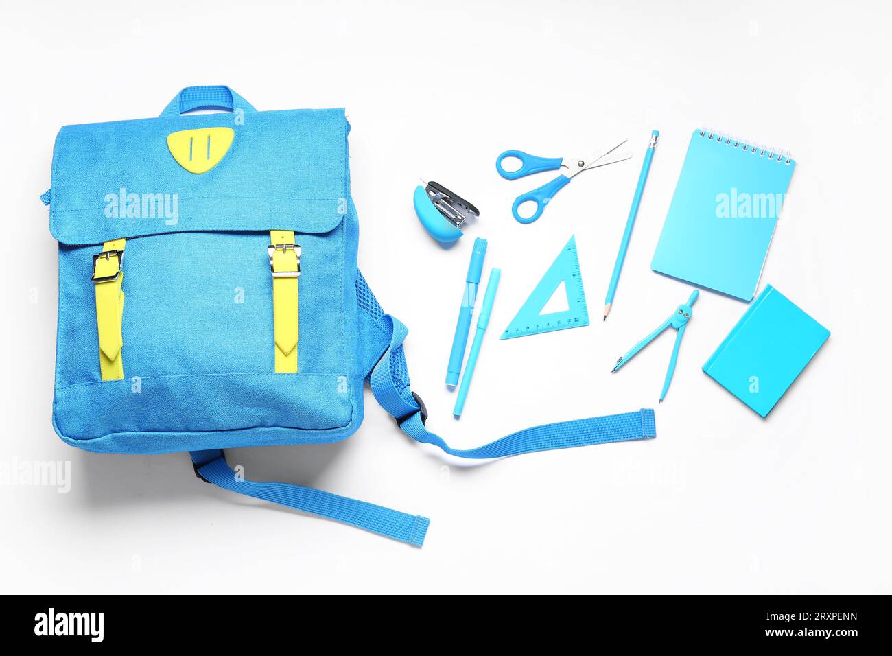 Stylish school backpack and different stationery on white background Stock Photo