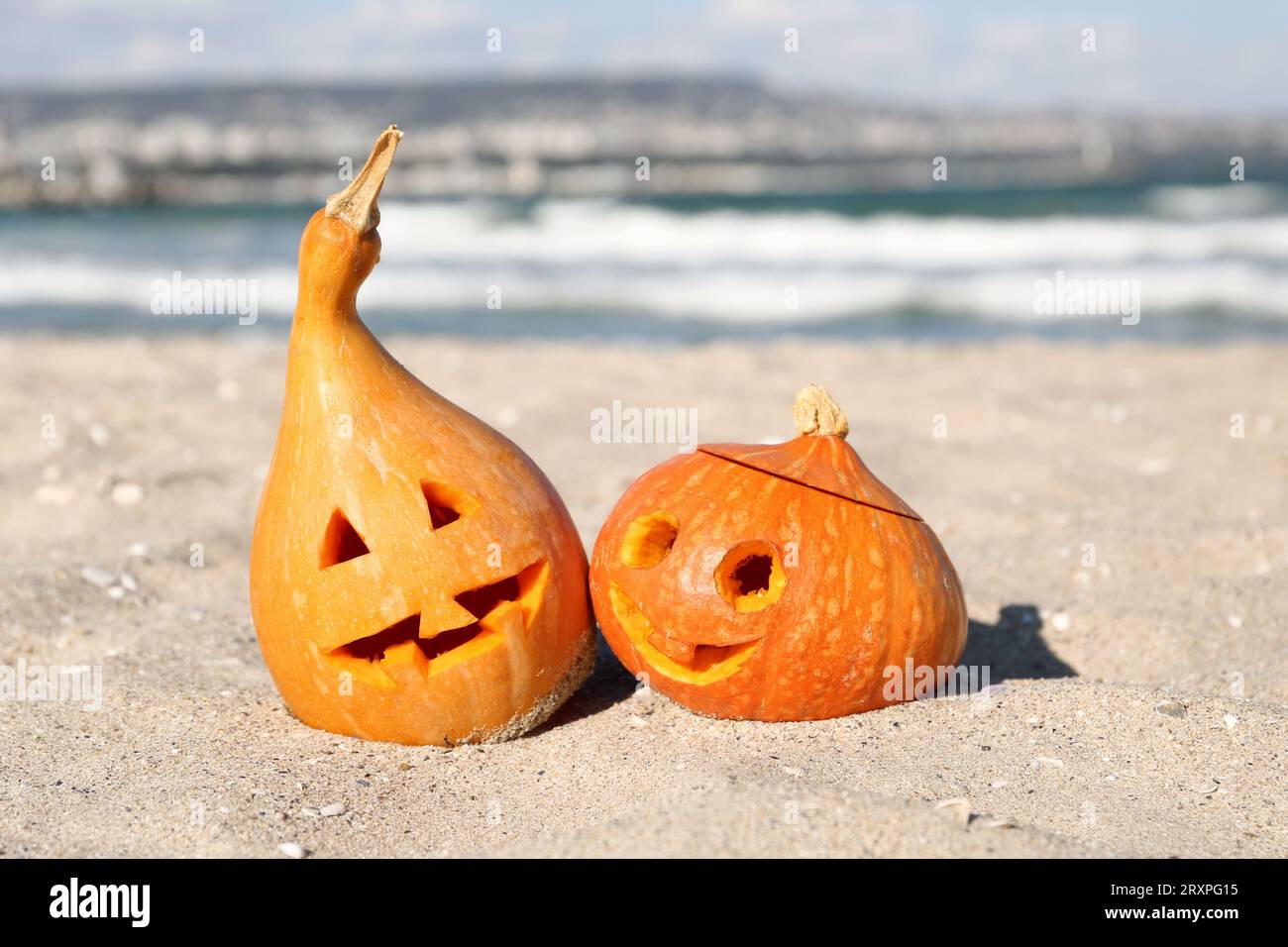 Carved pumpkins for Halloween on beach Stock Photo - Alamy