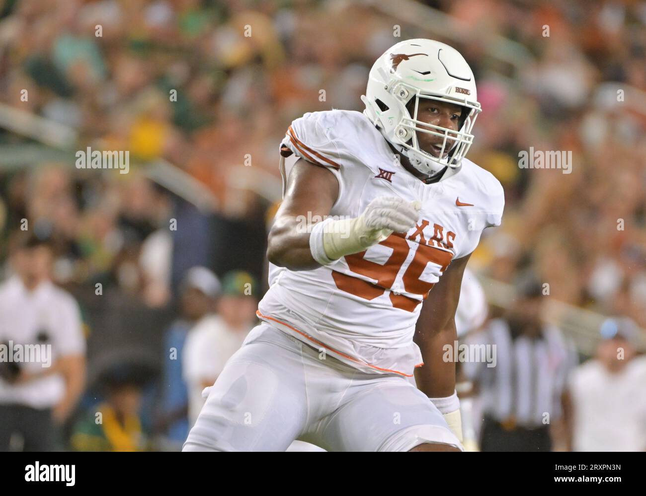 Waco, Texas, USA. 23rd Sep, 2023. Texas Longhorns defensive lineman Alfred Collins (95) rushes the quarterback during the 1st half of the NCAA Football game between the Texas Longhorns and Baylor Bears at McLane Stadium in Waco, Texas. Matthew Lynch/CSM/Alamy Live News Stock Photo