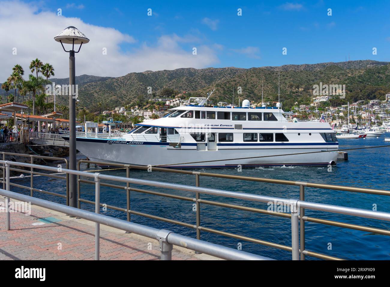 Avalon, CA, USA - September 13, 2023: Catalina Express ship, a ferry service between Catalina Island and mainland California, docked at the harbor in Stock Photo