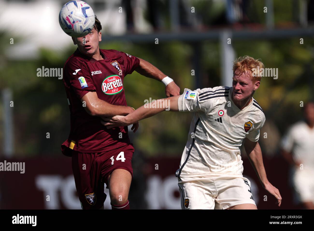 Turin, Italy. 24th Sep, 2023. Cristian Padula of Torino FC tussles with Lovro Golic of AS Roma during the Primavera 1 match at Stadio Valentino Mazzola, Turin. Picture credit should read: Jonathan Moscrop/Sportimage Credit: Sportimage Ltd/Alamy Live News Stock Photo