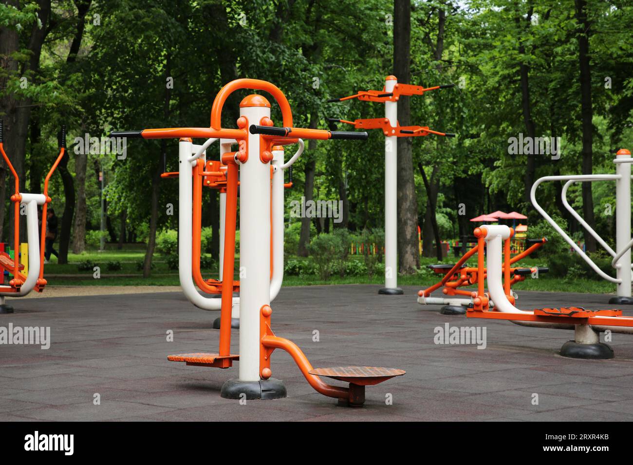 Empty outdoor gym with air walker, ovate stepper, twister and surfer Stock Photo