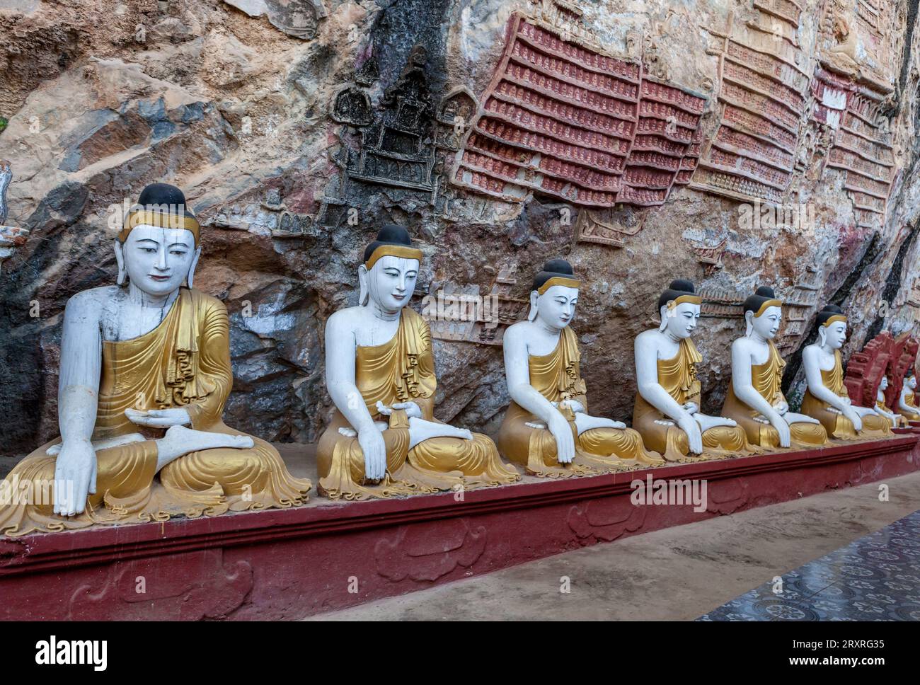 Old temple with buddha statues in Kaw Goon cave. Stock Photo
