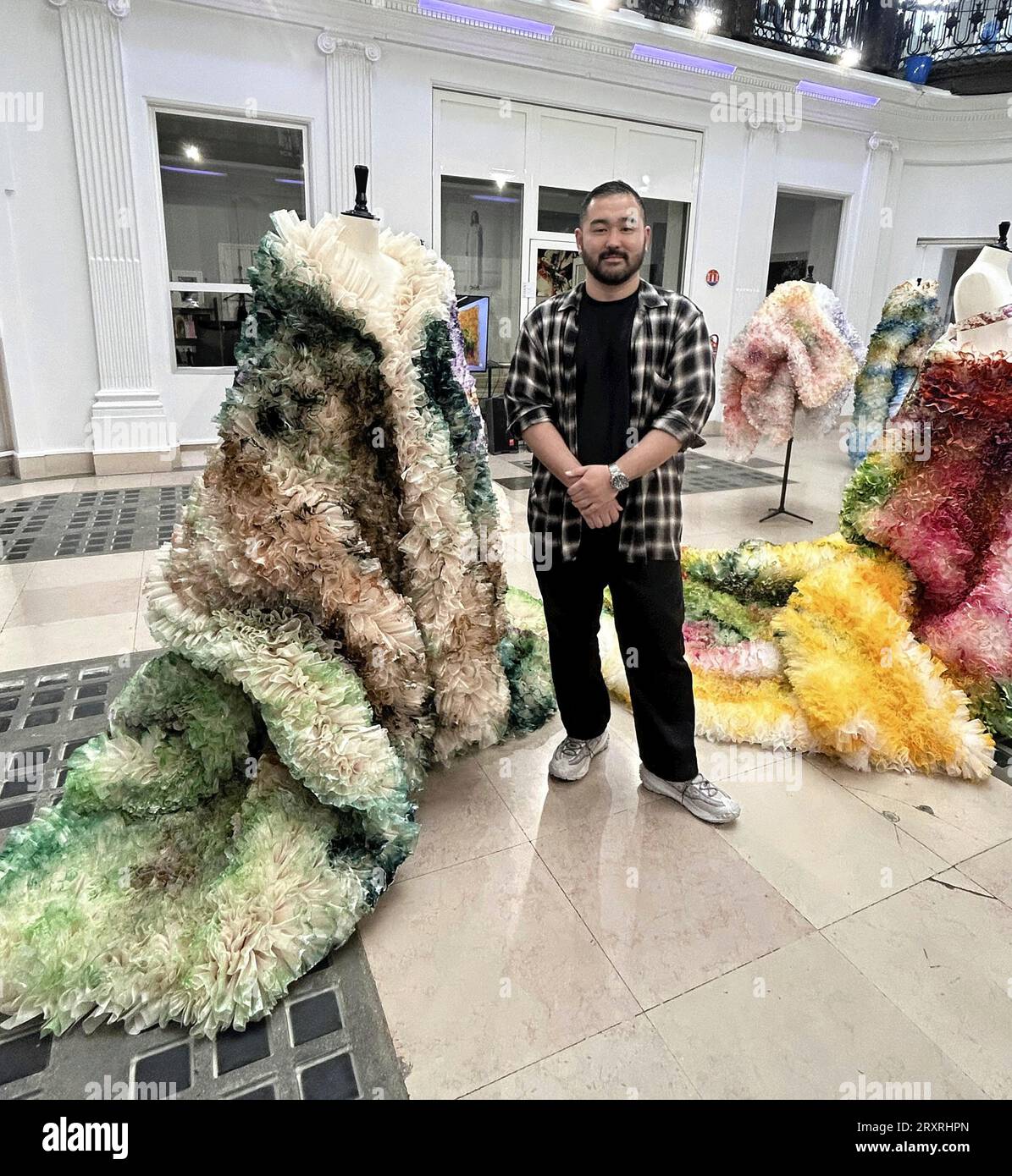 Dress as a painting, Painting as a dress" created by Japanese fashion  designer Tomo Koizumi is displayed on opening day in Paris, France on Sept.  25, 2023. 35-year-old Koizumi is known