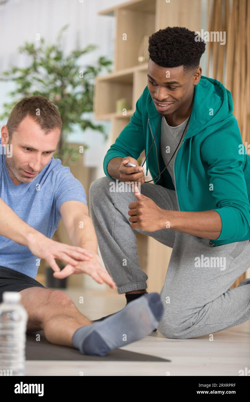 Muscular man doing stretching hi-res stock photography and images - Alamy