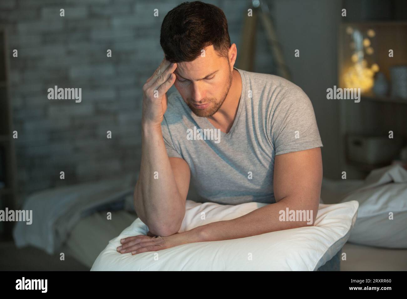 sleepless and desperate  man awake at night Stock Photo