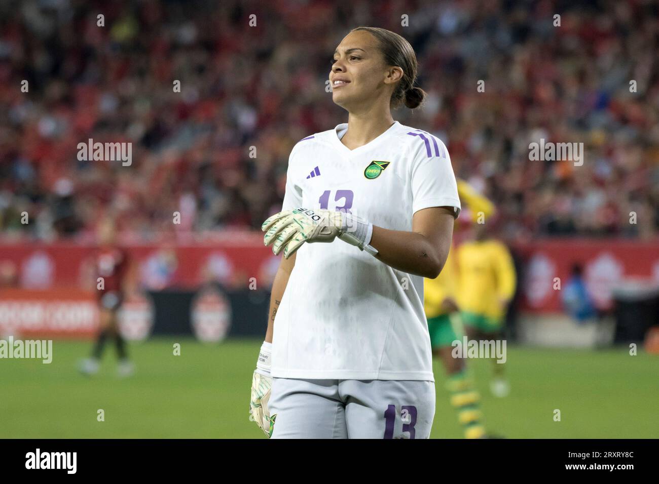 Rebecca Spencer 13 in action during the CONCACAF Women's Championship