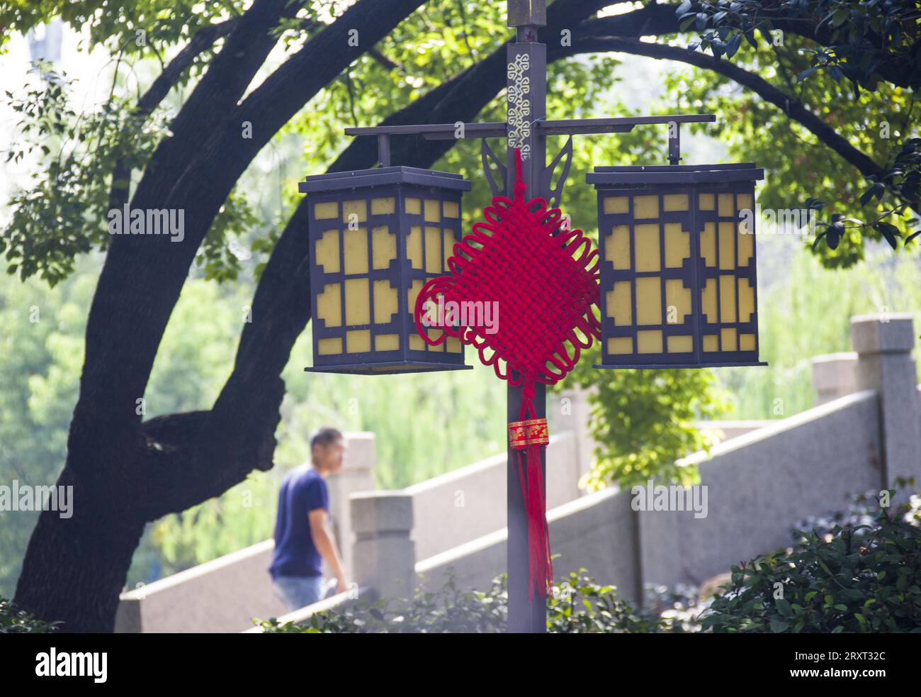 Red Chinese knots are hung up at Bailuzhou Park to welcome the Mid ...
