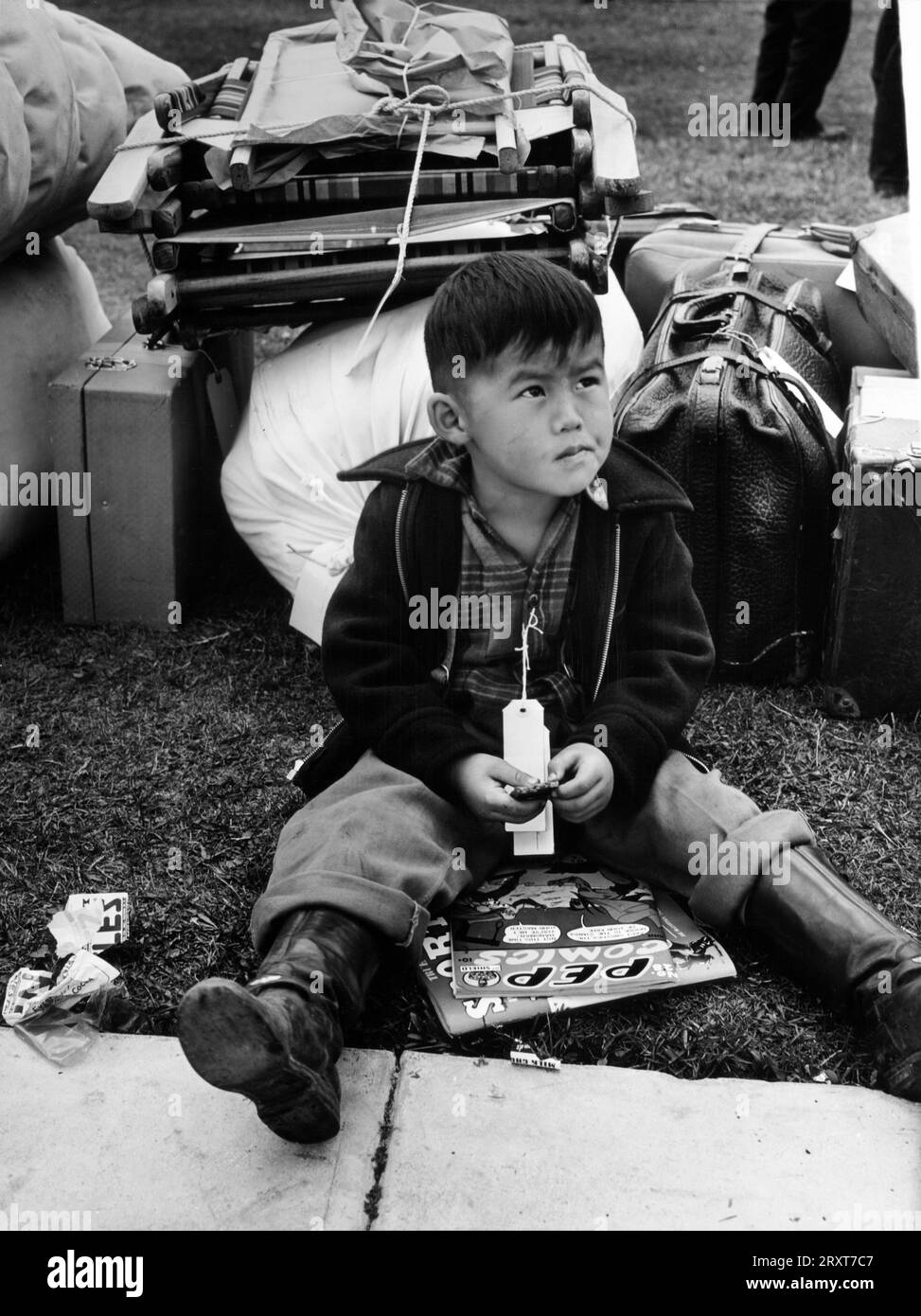Russell Lee: Tagged for evacuation, Salinas, California, May 1942 110,000 Japanese nationals and Japanese Americans were forcibly relocated and interned in housing facilities called 'War Relocation Camps', in the wake of Imperial Japan's attack on Pearl Harbor. Stock Photo