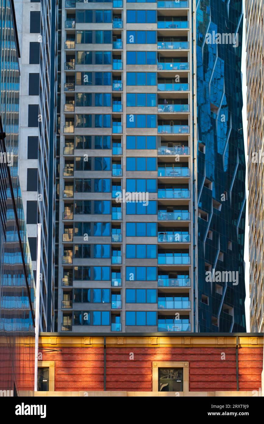 Visual Reference: Modern City Building Apartment Block With Balconies Windows And Glass