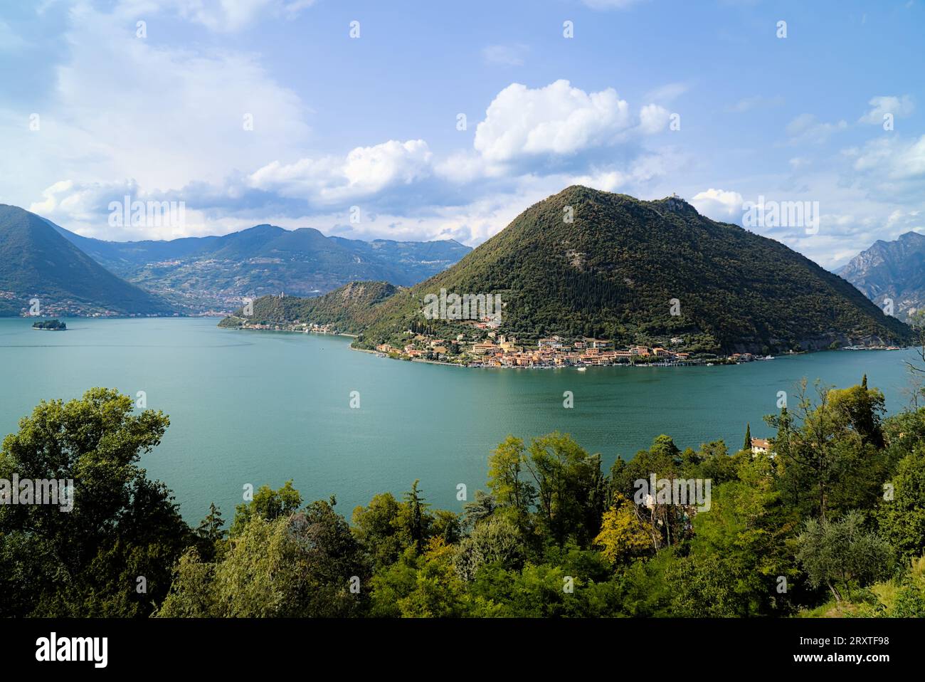 A panoramic view over the Lake Iseo and the Monte Isola island in northern Italy Stock Photo