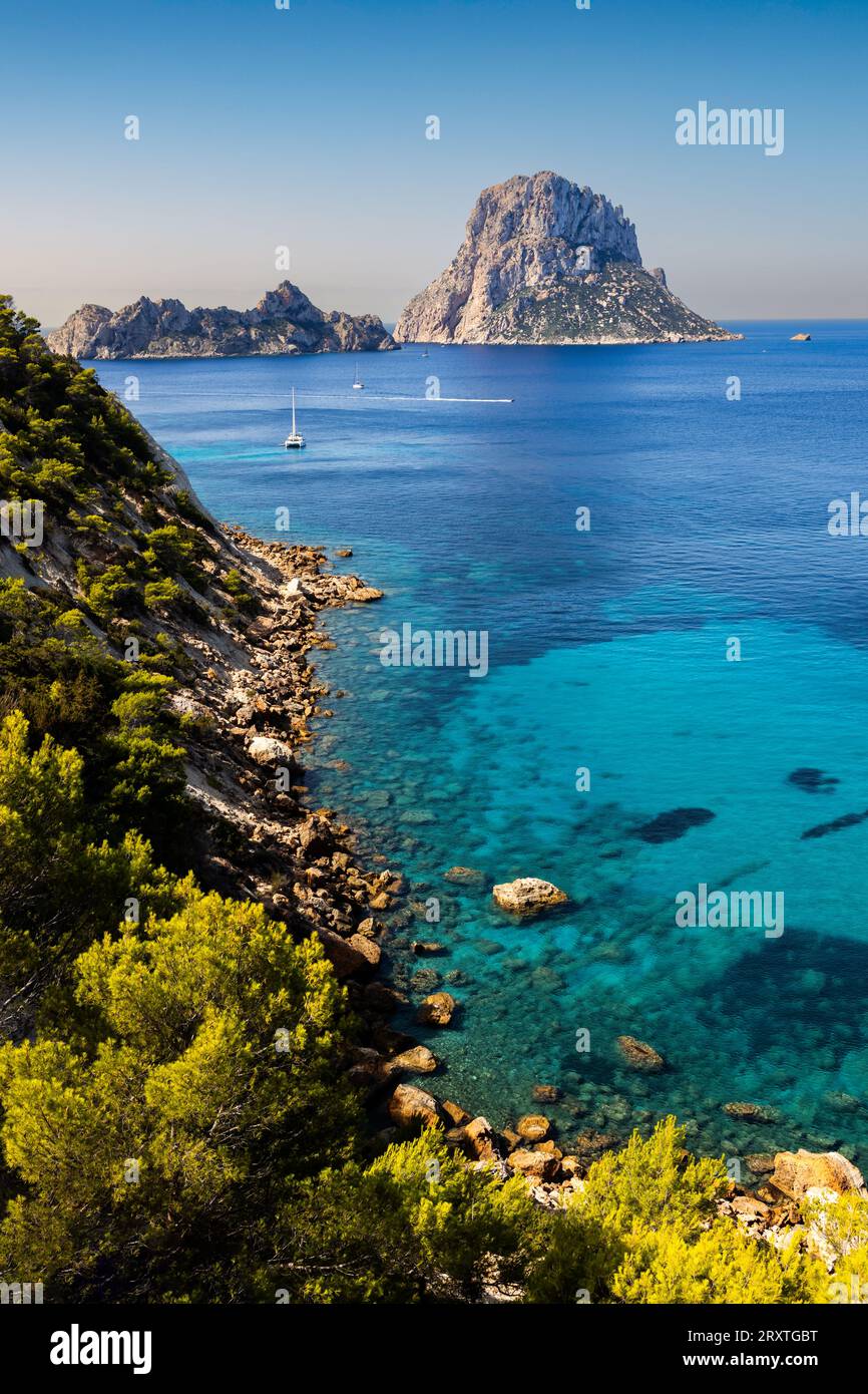 Es Vedra on a beautiful Summer's day, with deep blues in the sea and sky Stock Photo