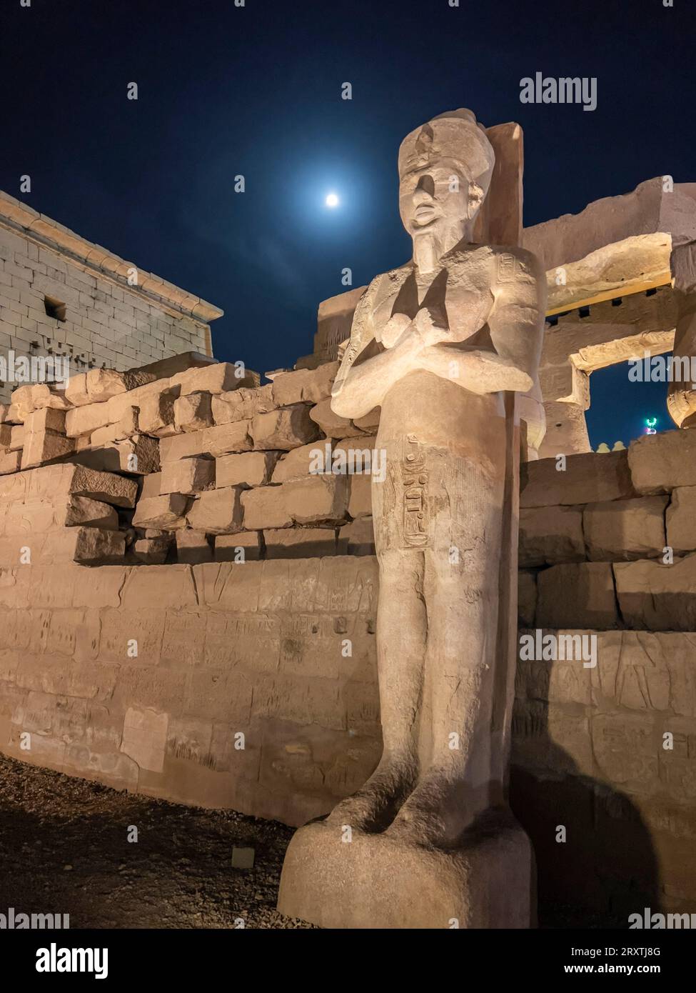 The Luxor Temple at night, under a full moon, constructed approximately 1400 BCE, UNESCO World Heritage Site, Luxor, Thebes Stock Photo