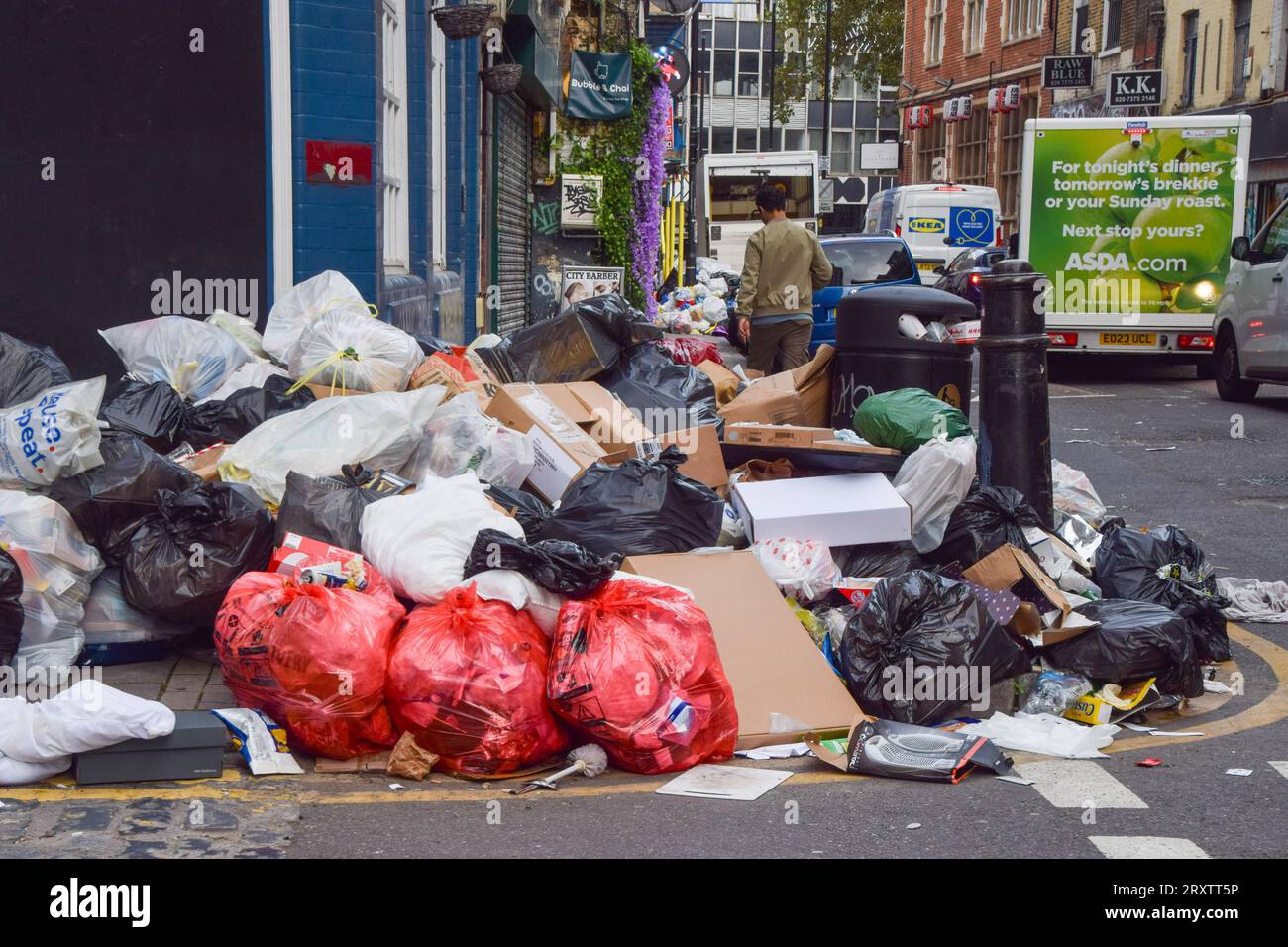 September 27, 2023, London, England, UK: Huge piles of garbage line the ...