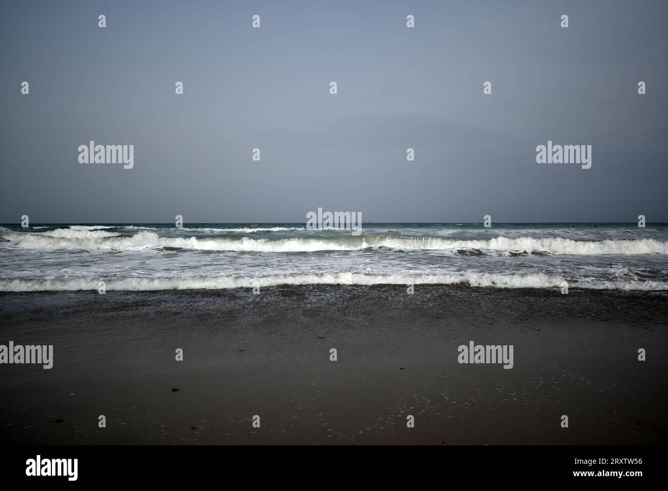 Tranquil Beach Day at El Saler: Cloudy Horizon Stock Photo