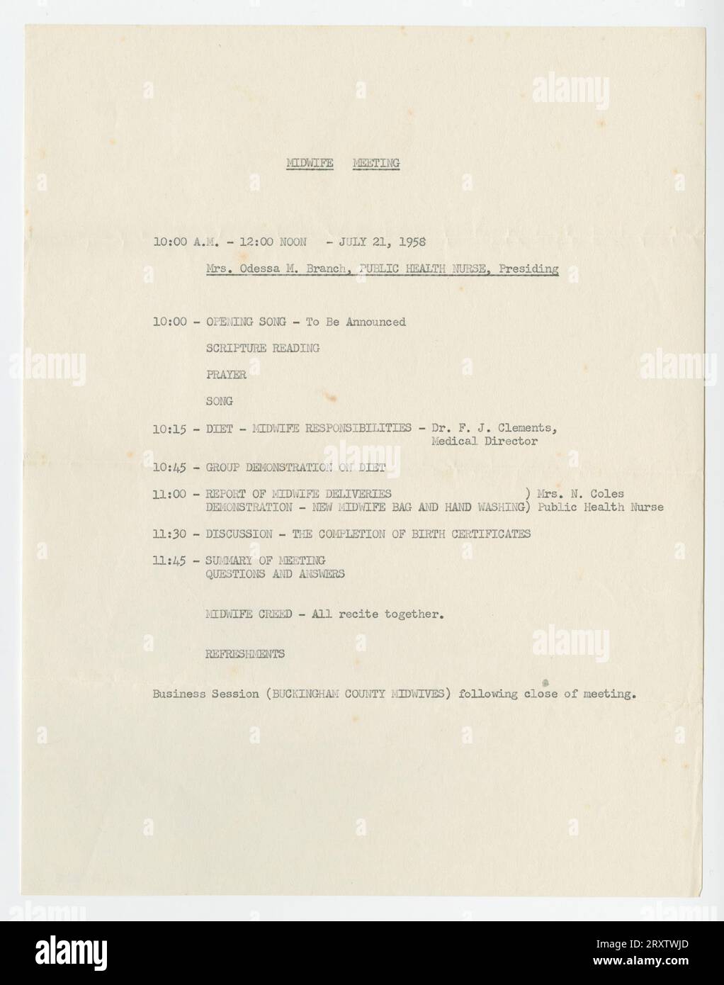 An agenda for a midwife meeting dated July 21, 1958. Agenda items include an opening song, a lecture on midwife responsibilities with respect to diet, and a discussion about the completion of birth certificates. Possibly a carbon copy. Typewritten on white paper. Stock Photo