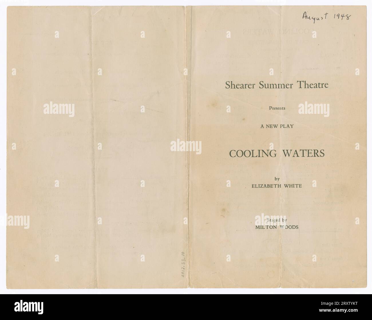 A program for the play 'Cooling Waters' by Liz White. The program is yellowed and has an assortment of creases and tears. Stock Photo