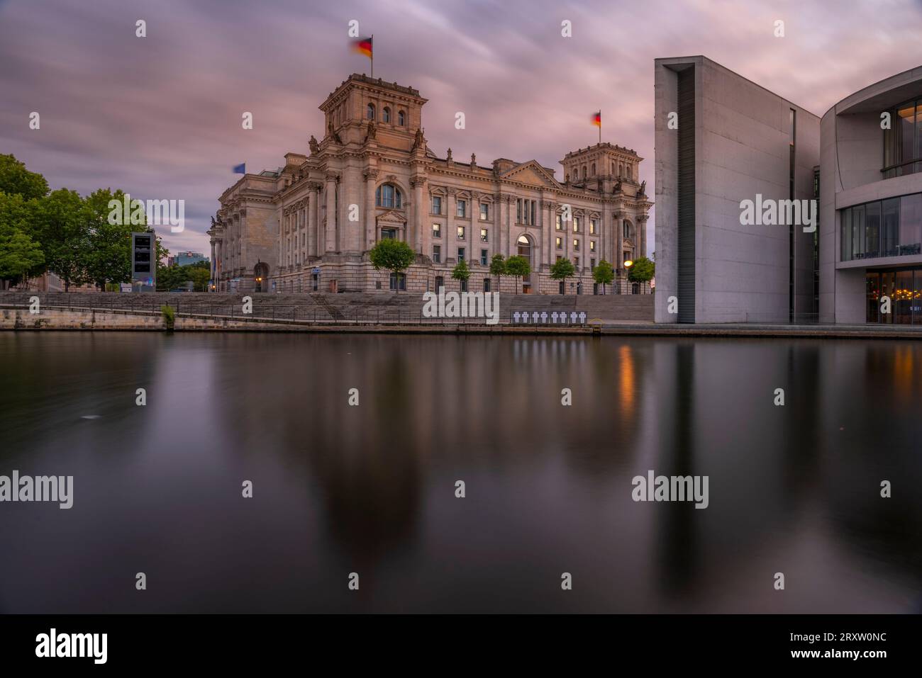 View of the River Spree and the Reichstag (German Parliament building) at sunset, Mitte, Berlin, Germany, Europe Stock Photo
