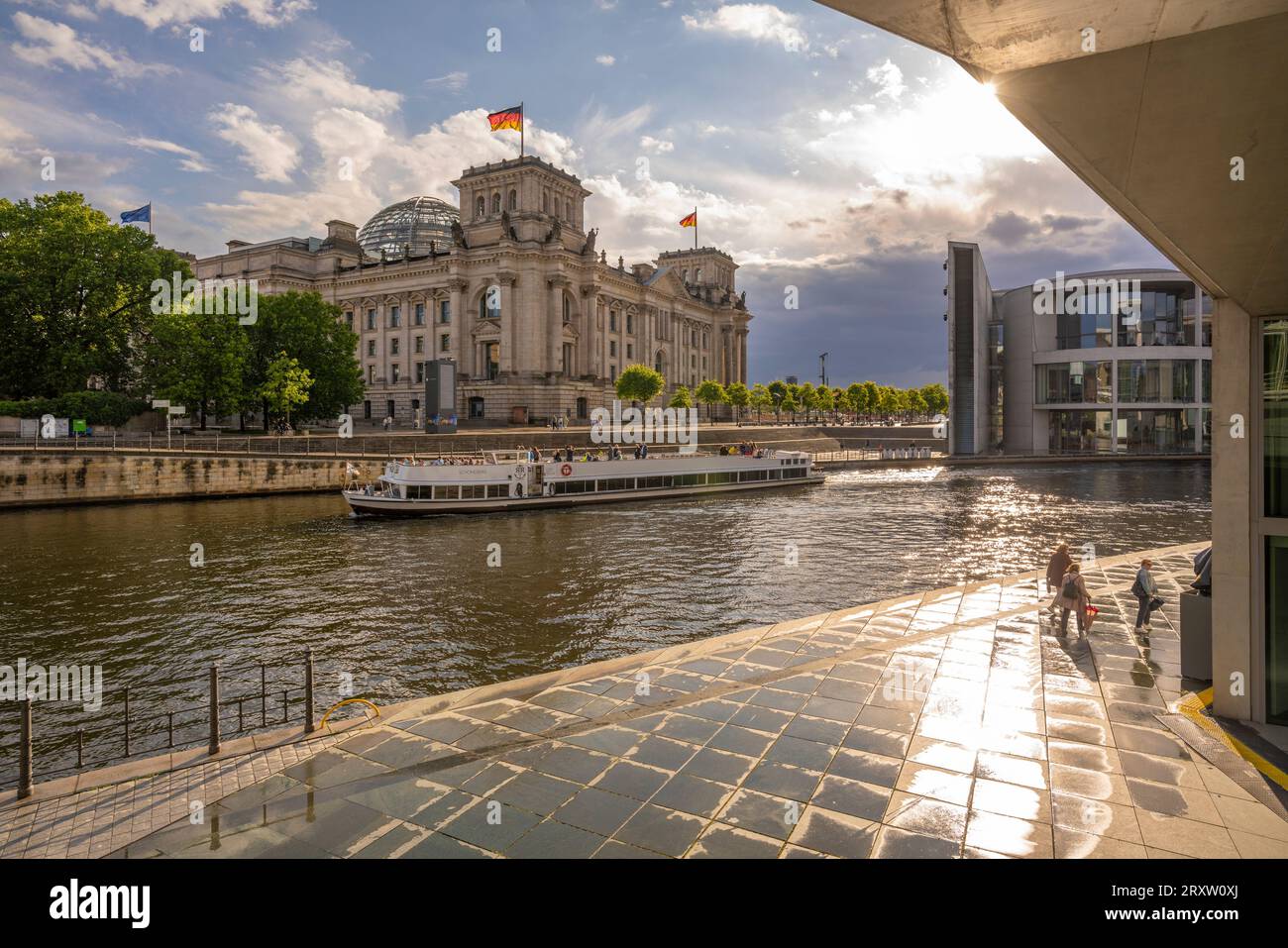 View of sightseeing cruise boat on River Spree and the Reichstag ...