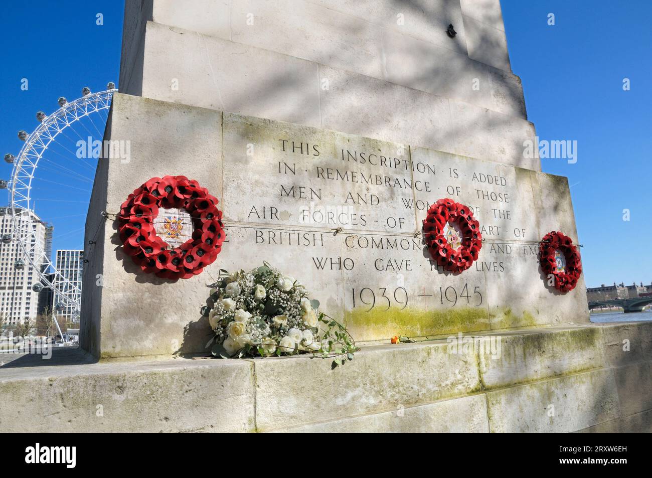 The Royal Air Force Memorial / RAF Memorial with inscription, flowers and poppy wreaths, Whitehall Stairs, Victoria Embankment, London England, UK Stock Photo