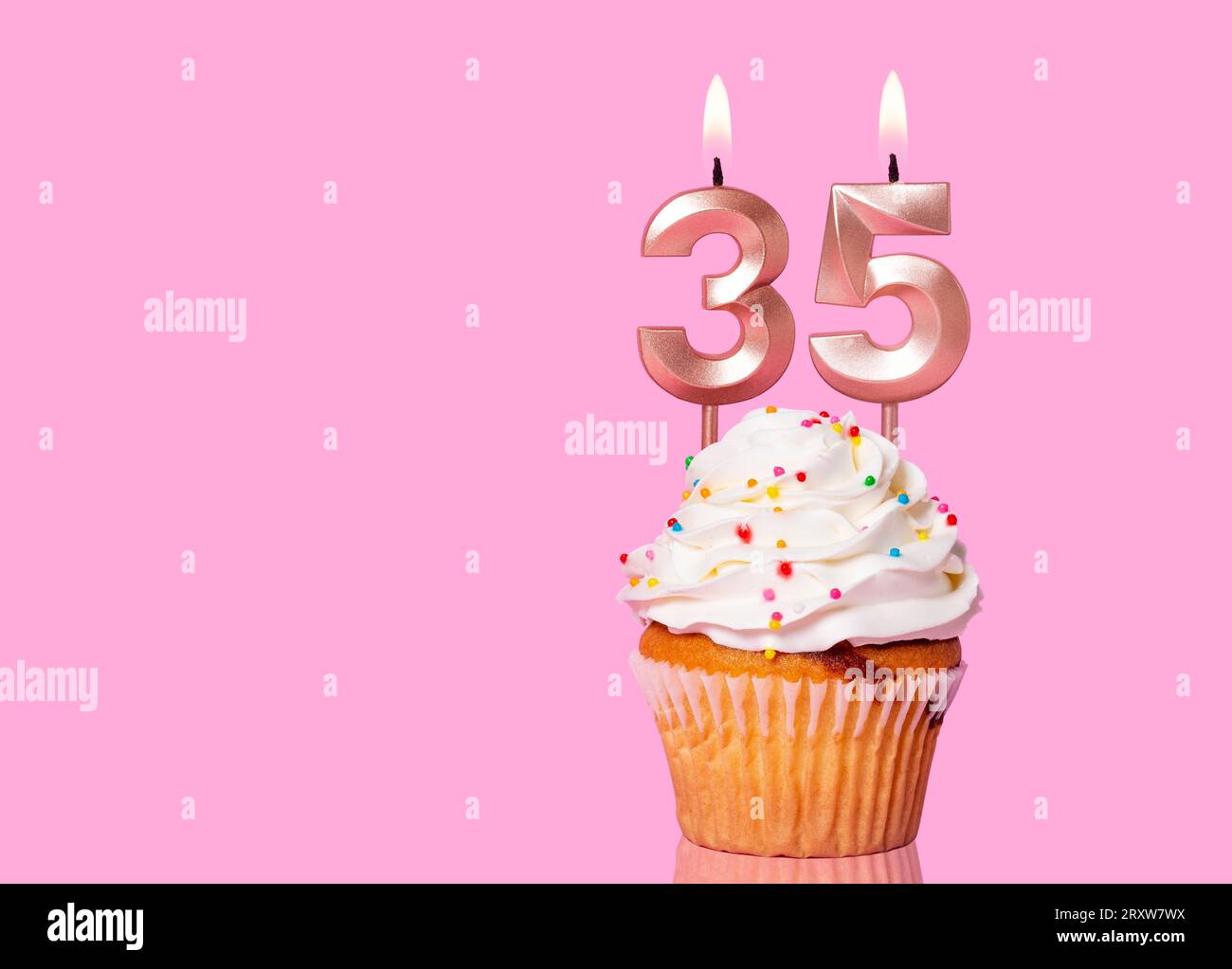 Birthday Cake With Candle Number 35 - On Pink Background. Stock Photo