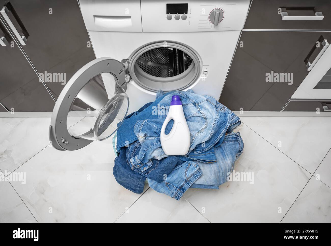 Detergent for washing and cleaning denim. Stock Photo