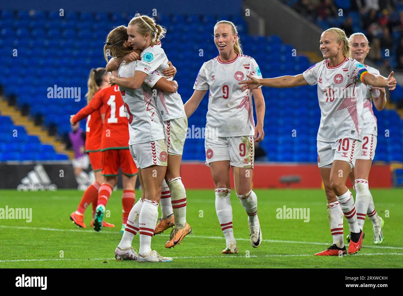 Cardiff, Wales. 26 September 2023. Frederikke Th¿gersen of Denmark is congratulated by her team mates during the UEFA Women's Nations League match between Wales and Denmark at the Cardiff City Stadium in Cardiff, Wales, UK on 26 September 2023. Credit: Duncan Thomas/Majestic Media. Stock Photo
