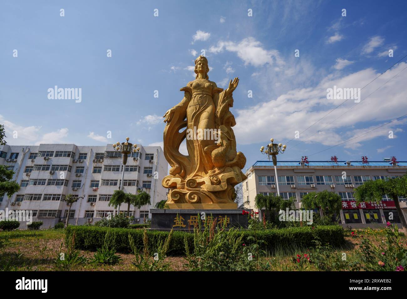 Luannan County, China - June 10, 2022: Salt Mother Sea God Sculpture at Daqinghe Salt Field. Stock Photo