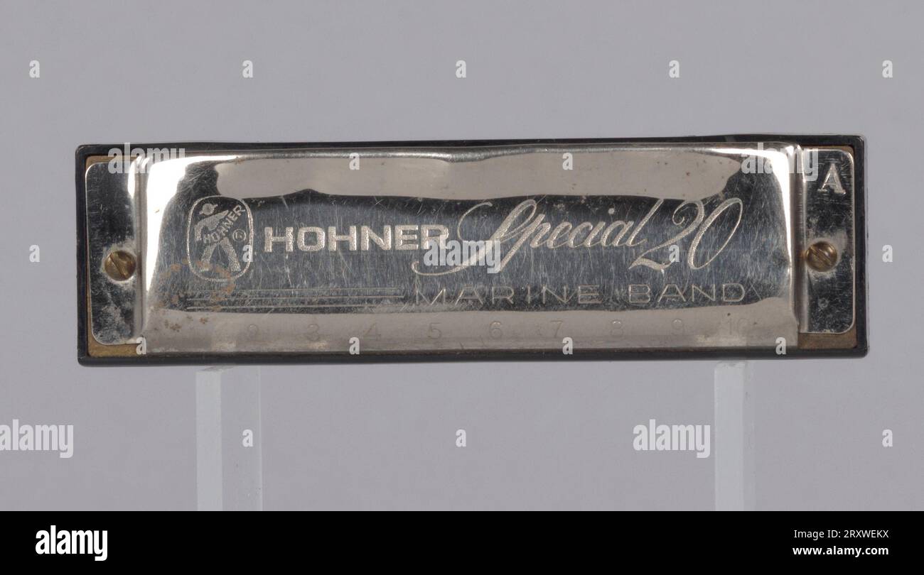A metal and plastic harmonica used by Arthur Lee. The harmonica is etched  with lettering on the top and bottom. The lettering on the top of the  harmonica reads “HOHNER Special 20 /
