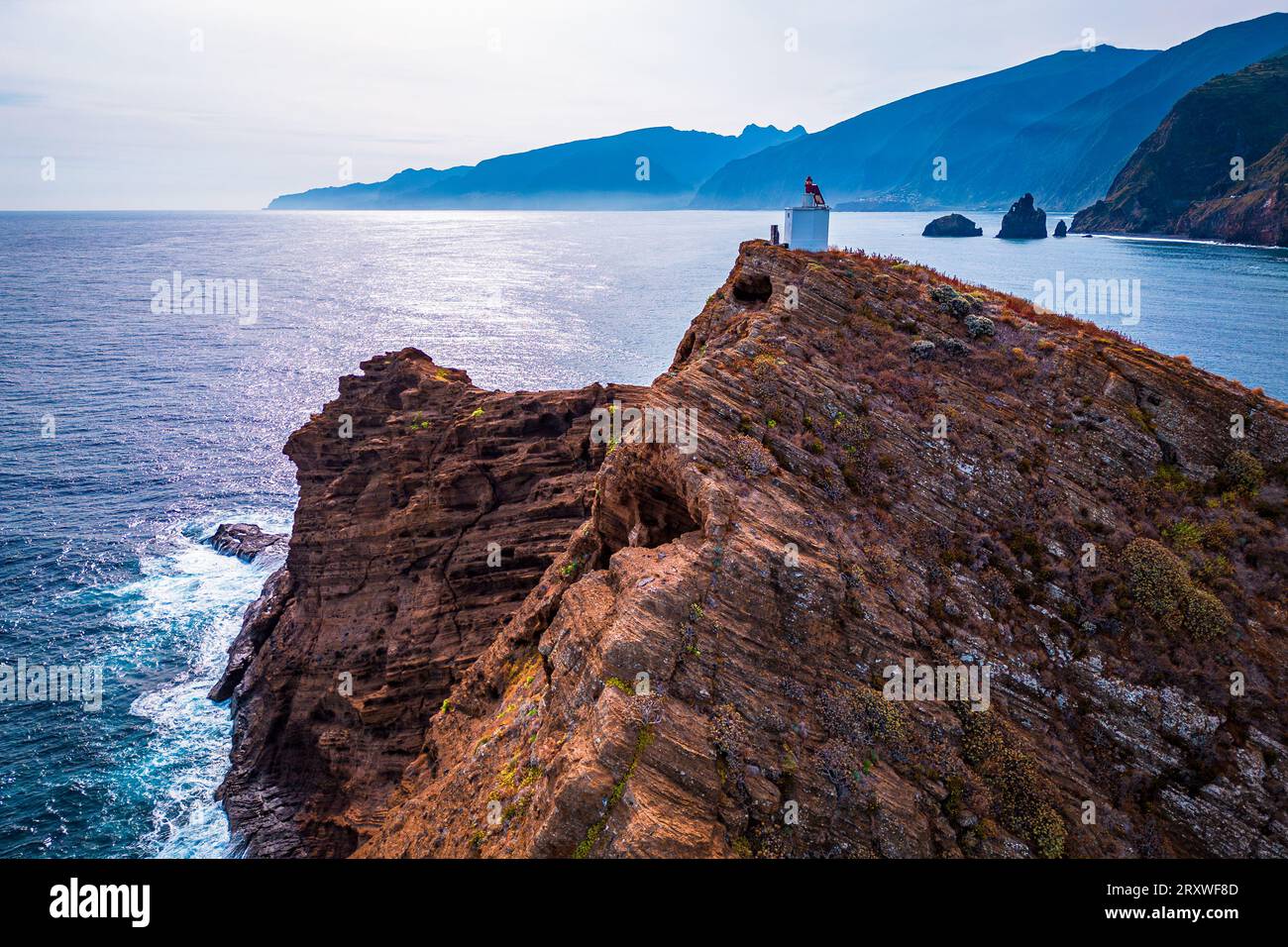 Scenic aerial view of the small island Ilheú Mole off Porto Moniz ...