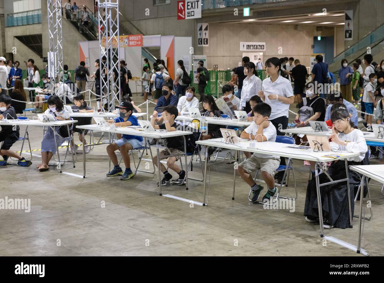 Children listen to a facilitator of a sound design workshop for kids inside  the family and kids corner at the Tokyo Game Show 2023 in Makuhari Messe  Stock Photo - Alamy