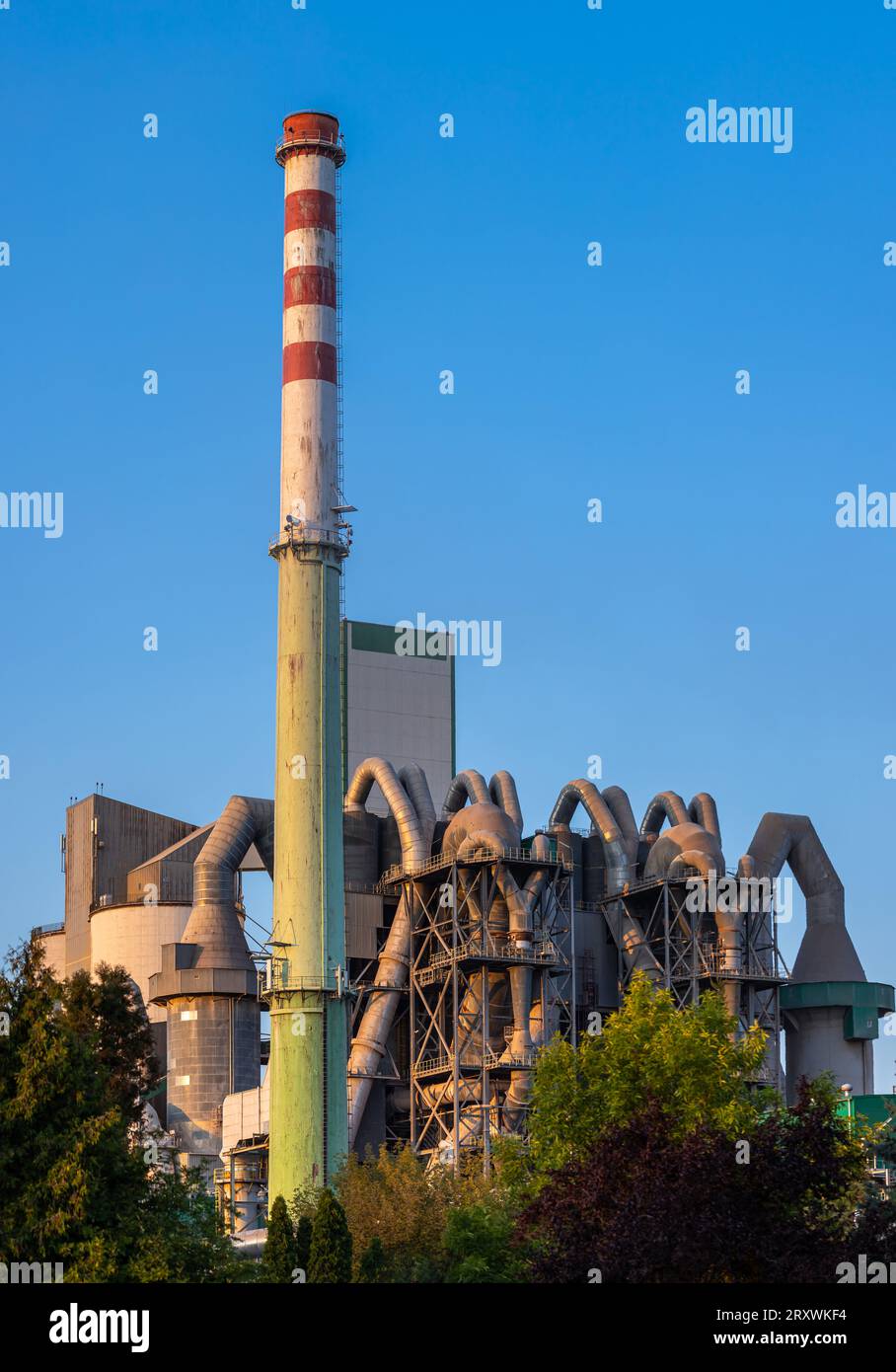 Cement plant - view of the external layout of the production line. Technology used in the production of building materials. Photo taken during the day Stock Photo