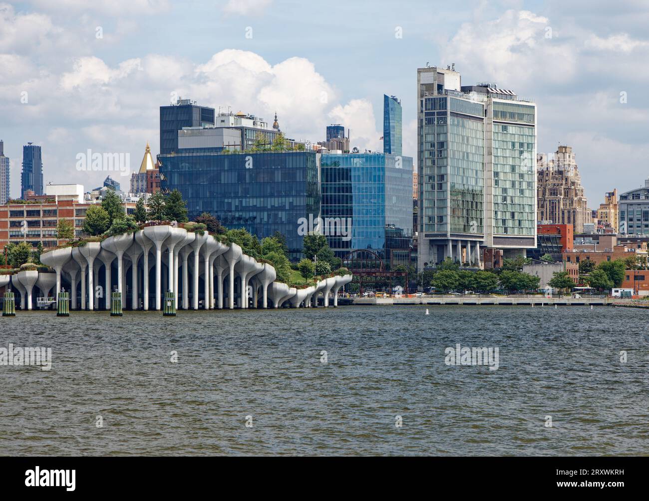 Little Island rises on precast cement “tulip pot” stilts; two foot