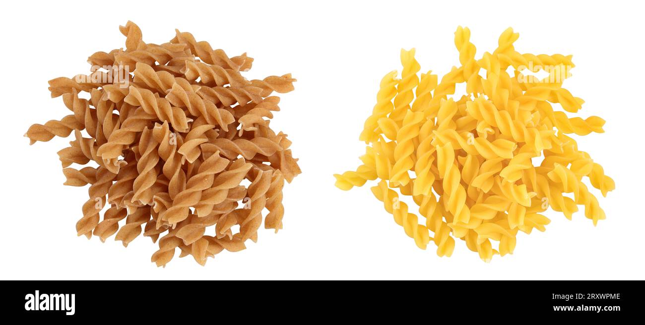 Picture of brown and yellow fusilli pasta from durum wheat isolated on white ...