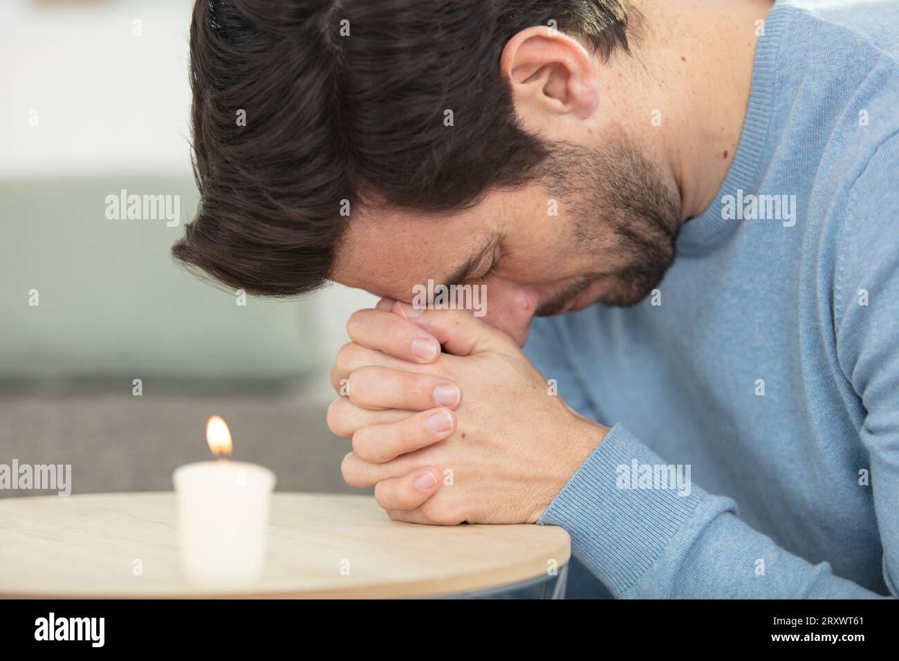 picture of young guy prayer or meditation Stock Photo