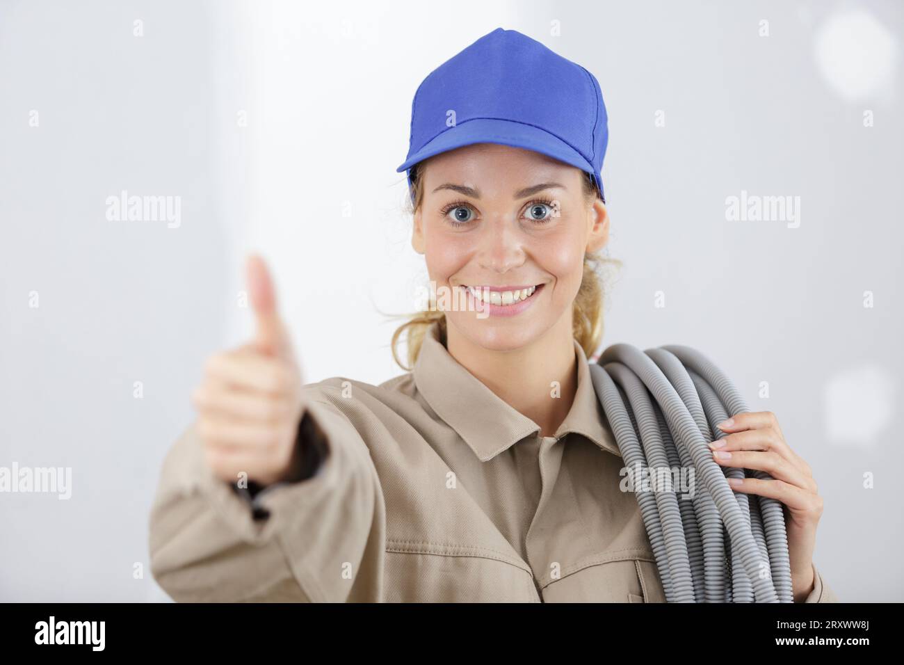 Happy woman worker thumb hi-res stock photography and images - Alamy