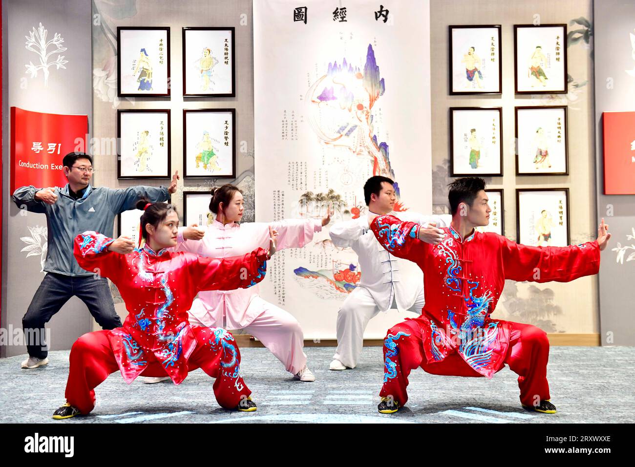 (230927) -- QUFU, Sept. 27, 2023 (Xinhua) -- Staff members from the Affiliated Hospital of Shandong University of Traditional Chinese Medicine perform Baduanjin, a martial art for fitness purposes, during the Ninth Nishan Forum on World Civilizations in Qufu, east China's Shandong Province, Sept. 27, 2023.  The forum on Confucius culture kicked off Wednesday in the city of Qufu, the birthplace of the prominent Chinese philosopher.   The Nishan Forum on World Civilizations, the ninth since its inception in 2010, has attracted 330 foreign guests, including politicians, representatives from inter Stock Photo