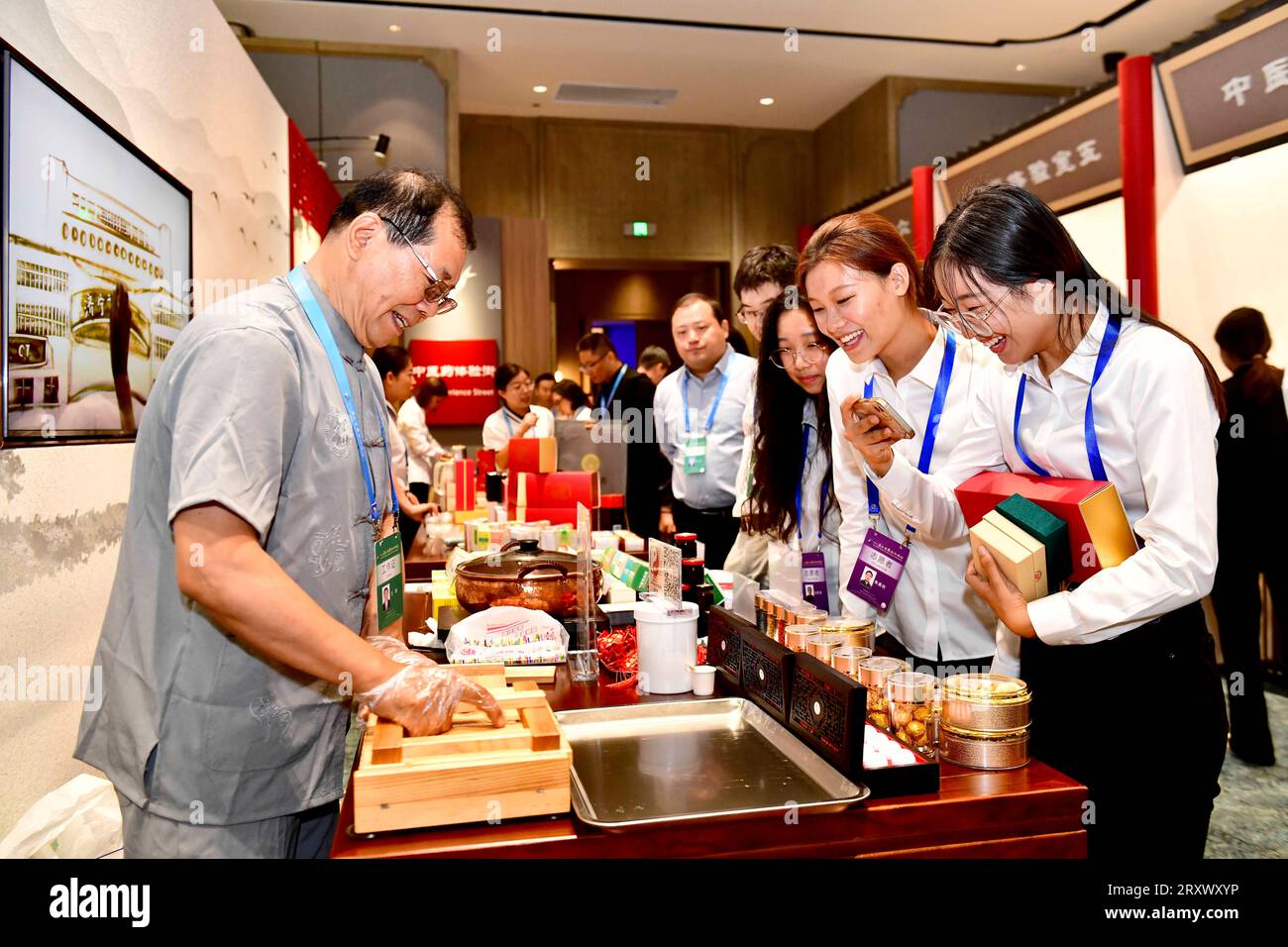 (230927) -- QUFU, Sept. 27, 2023 (Xinhua) -- A staff member from the Affiliated Hospital of Shandong University of Traditional Chinese Medicine demonstrates the making of herbal pills during the Ninth Nishan Forum on World Civilizations in Qufu, east China's Shandong Province, Sept. 27, 2023.  The forum on Confucius culture kicked off Wednesday in the city of Qufu, the birthplace of the prominent Chinese philosopher.   The Nishan Forum on World Civilizations, the ninth since its inception in 2010, has attracted 330 foreign guests, including politicians, representatives from international organ Stock Photo
