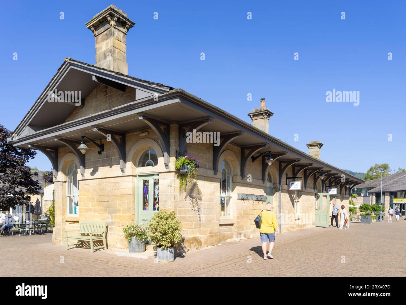 Former Rowsley station ticket office now ASHGATE HOSPICE CARE in the outlet Peak shopping Village Rowsley Derbyshire Dales Derbyshire England UK GB Stock Photo