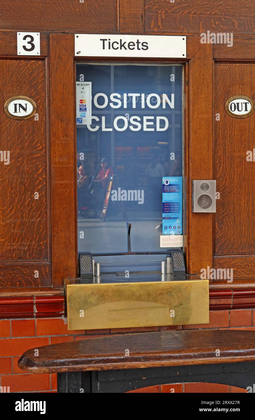 Position Closed ticket window at Victoria railway station at Manchester, England, UK, M3 1WY - in / out Stock Photo