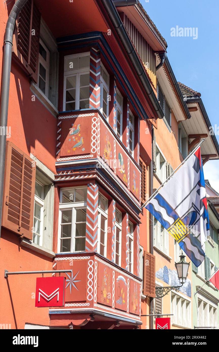 Balcony facade with Swiss flags, Augustinergasse, City of Zürich, Zürich, Switzerland Stock Photo
