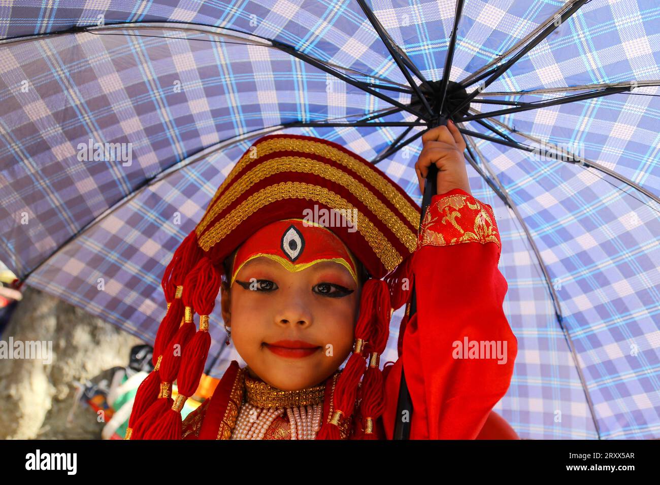 Kumari Pooja in Nepal A prepubescent Nepali girl poses for a photo as