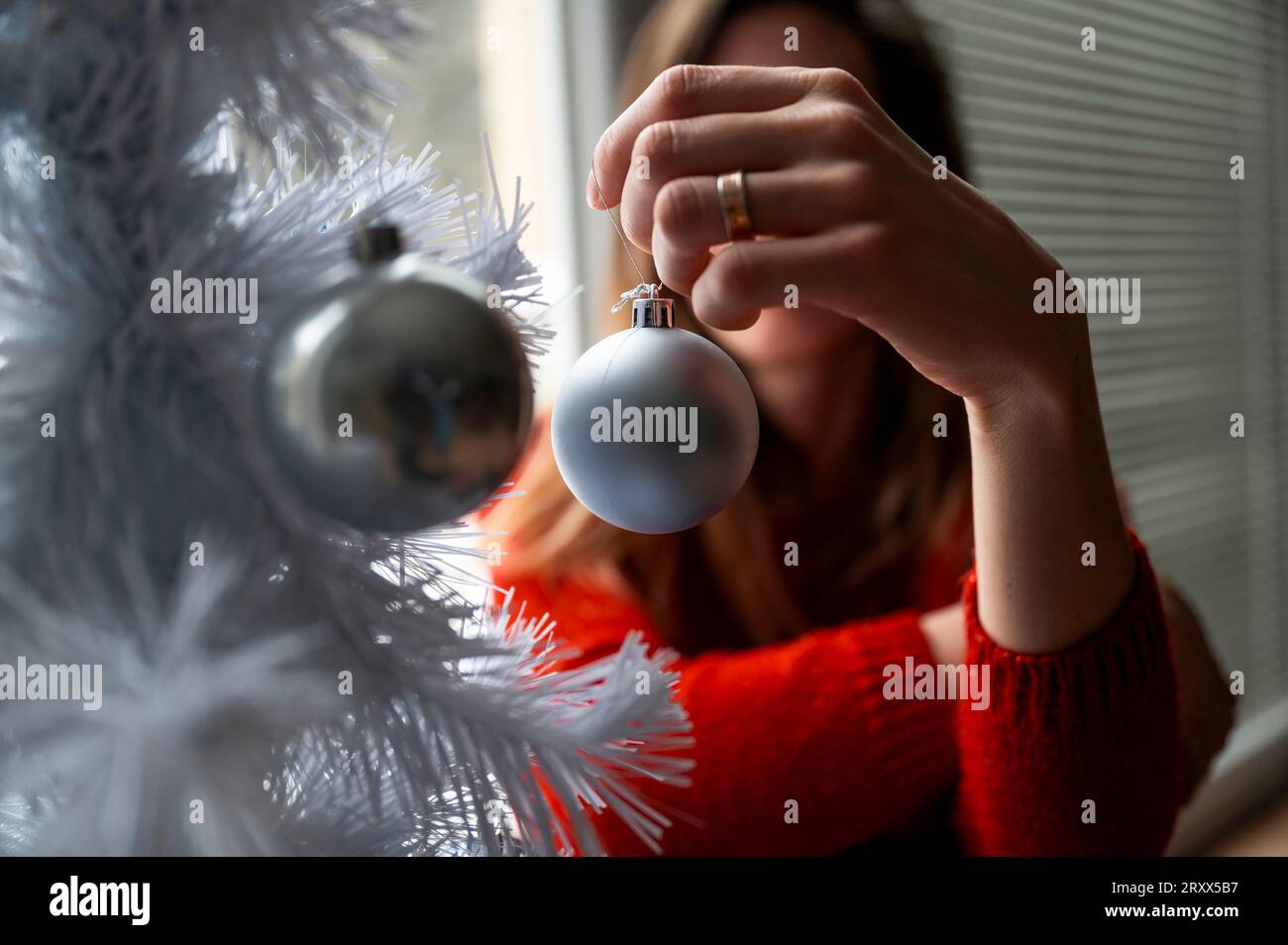 Woman in red sweater on hi-res stock photography and images - Alamy