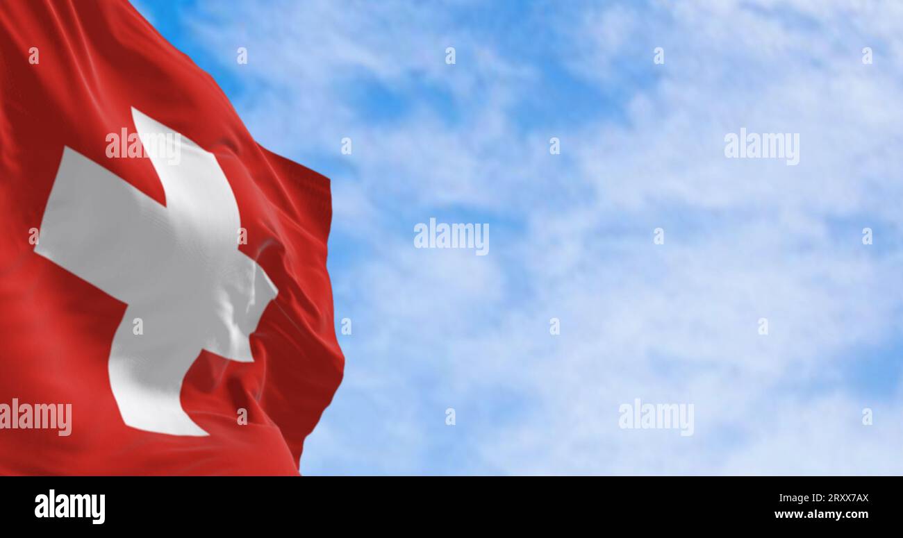 Switzerland national flag waving in the wind on a clear day. Red background with a white cross in the center. 3d illustration render. Fluttering fabri Stock Photo